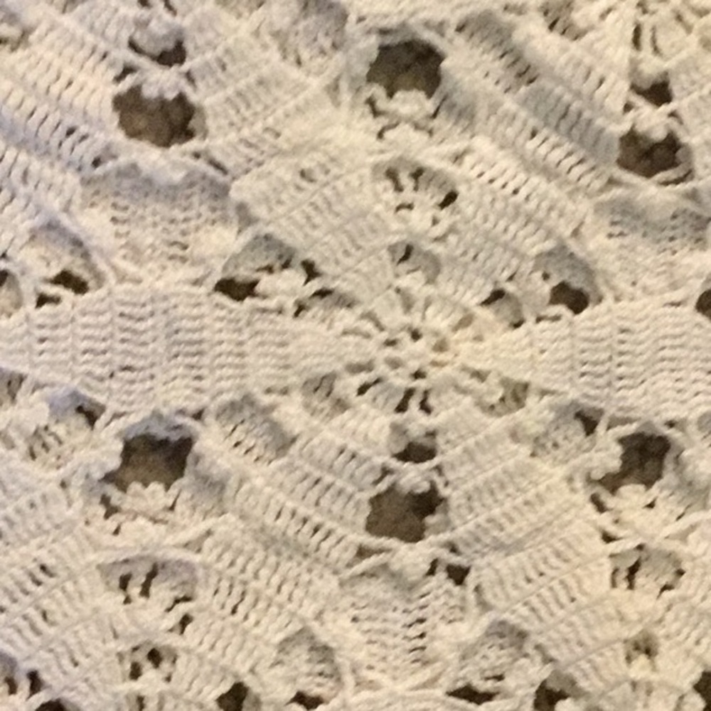 Hand crocheted table cloth